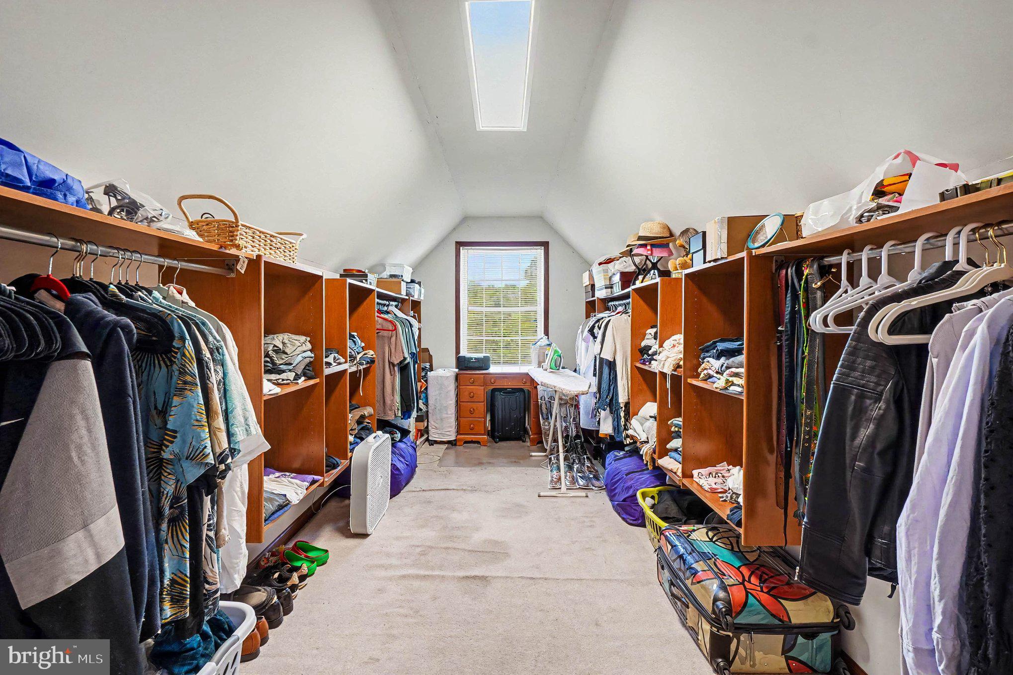 64 Open Meadow Court Elkton, MD 21921 - Photo 33 of 57 a view of walk in closet with clothes and shoes