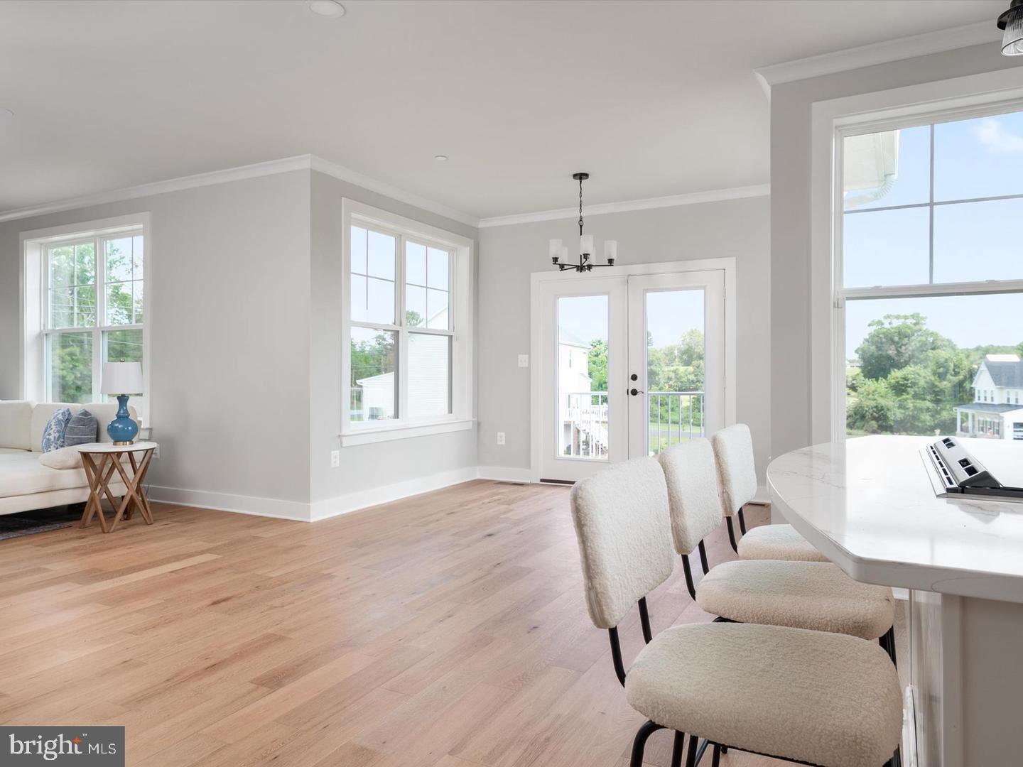 890 Alameda Drive Huntingtown, MD 20639 - Photo 11 of 51 a view of a dining room with furniture window and outside view