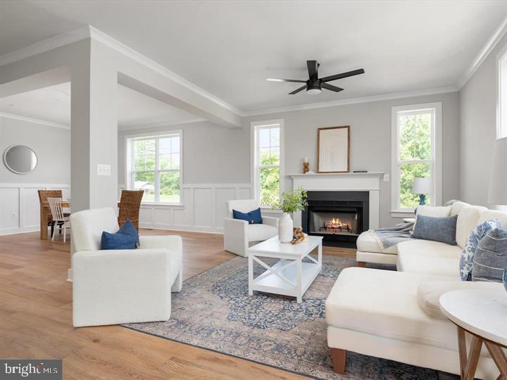 890 Alameda Drive Huntingtown, MD 20639 - Photo 21 of 51 a living room with furniture and a fireplace