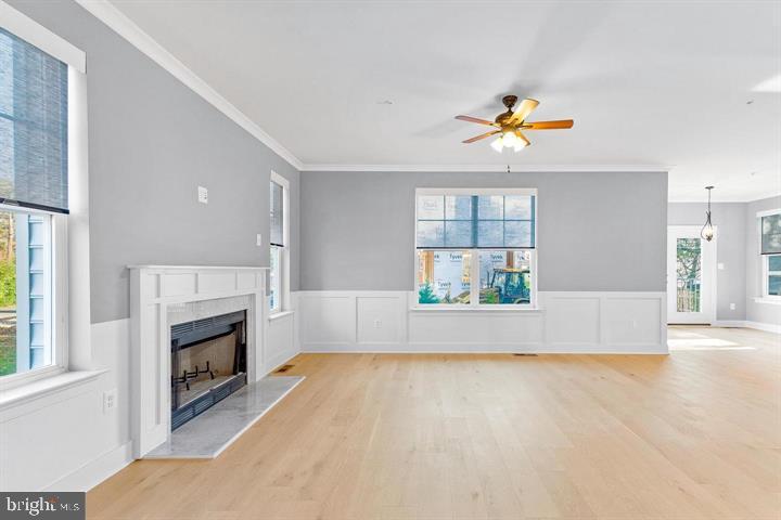 890 Alameda Drive Huntingtown, MD 20639 - Photo 22 of 51 a view of an empty room with a window and a kitchen