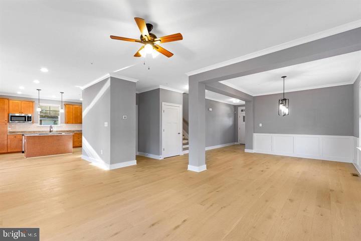890 Alameda Drive Huntingtown, MD 20639 - Photo 49 of 51 a view of a kitchen with a sink and a refrigerator
