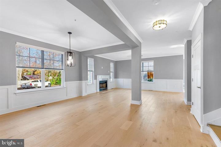 890 Alameda Drive Huntingtown, MD 20639 - Photo 27 of 51 a view of empty room with window and fireplace