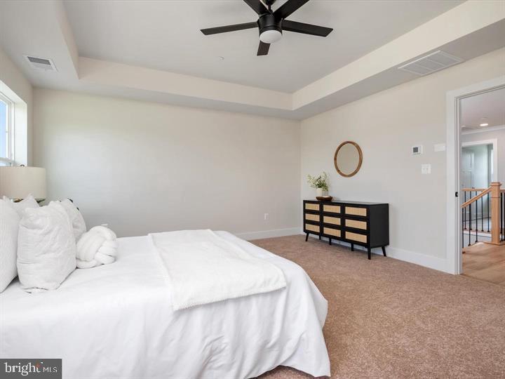 890 Alameda Drive Huntingtown, MD 20639 - Photo 35 of 51 a bed room with a bed and a chair