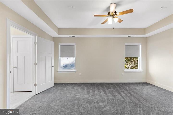 890 Alameda Drive Huntingtown, MD 20639 - Photo 36 of 51 wooden floor in an empty room with a window