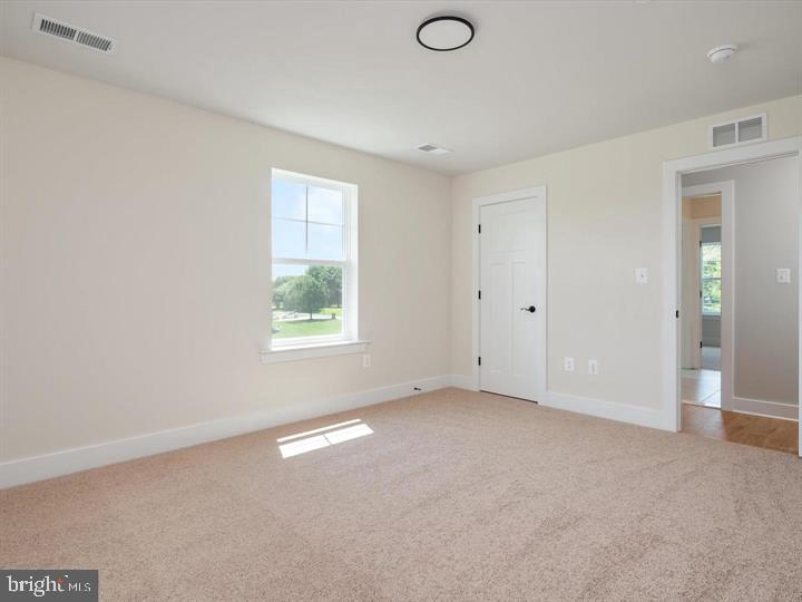 890 Alameda Drive Huntingtown, MD 20639 - Photo 40 of 51 a view of a big room with windows and cabinet