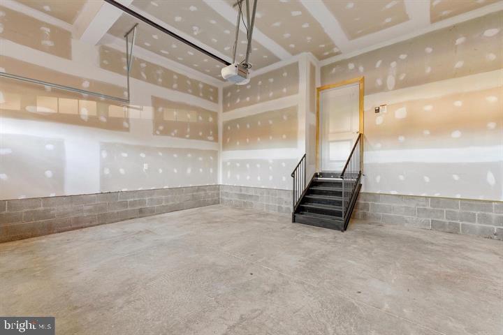 890 Alameda Drive Huntingtown, MD 20639 - Photo 45 of 51 a view of an empty room with stairs