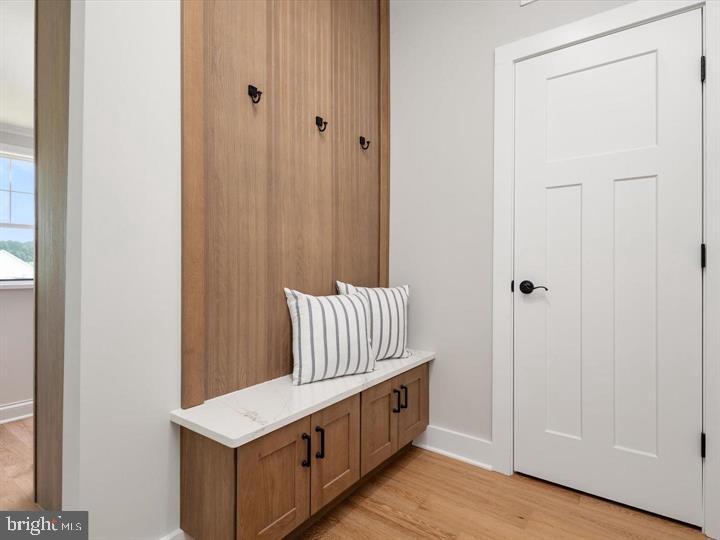 890 Alameda Drive Huntingtown, MD 20639 - Photo 46 of 51 a view of utility room with wooden floor