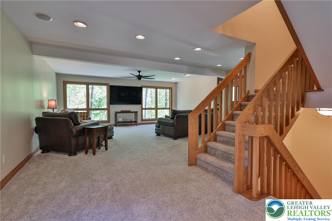 2159 Quarry Road Coopersburg, PA 18036 - Photo 25 of 79 Entry to family room from kitchen and stairs to the second floor library/office