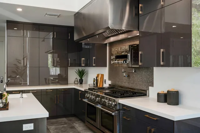 a kitchen with a stove and a sink