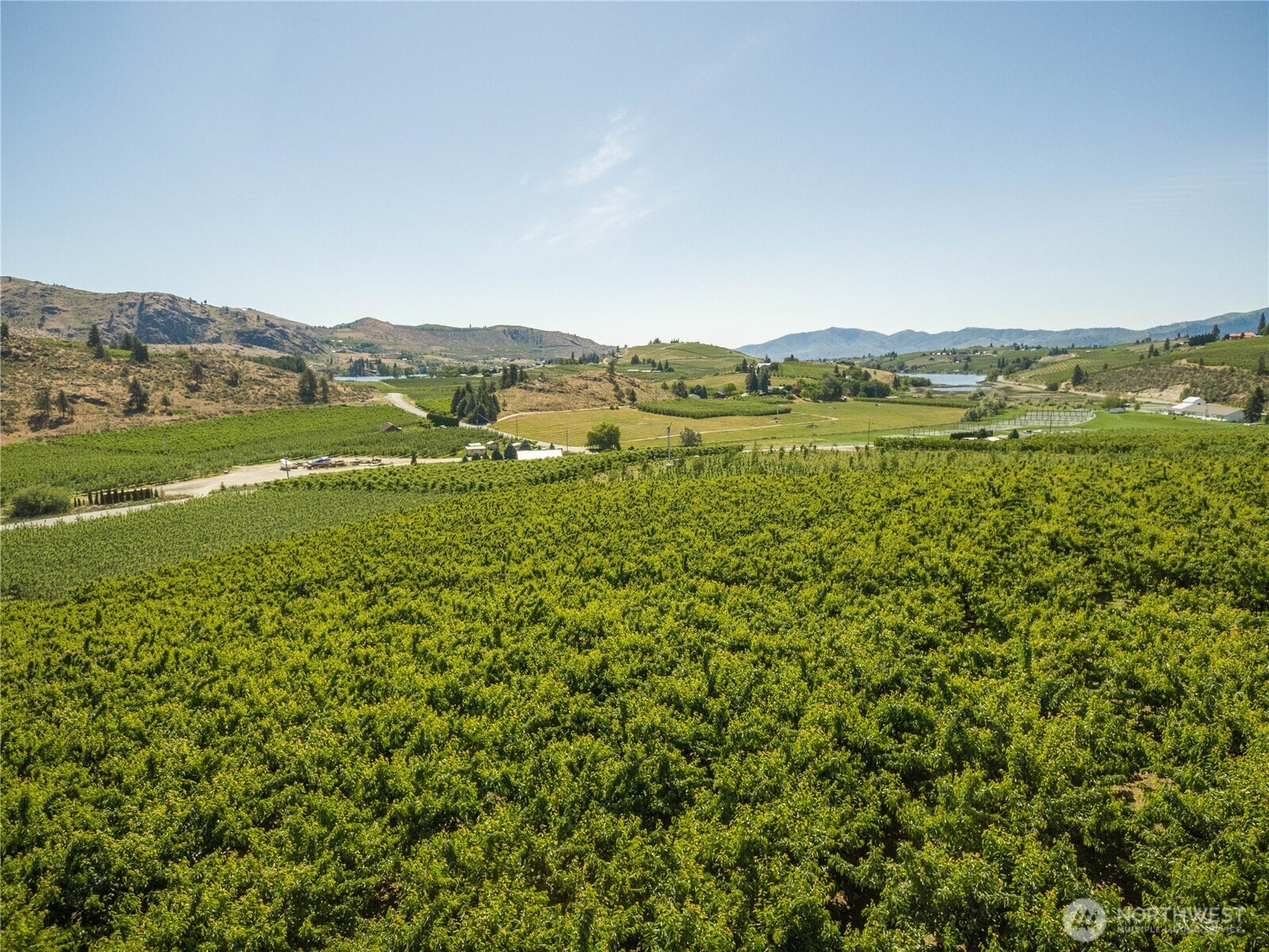 984 Loop Avenue Manson, WA 98831 - Photo 10 of 14 a view of a lake with a mountain in the background