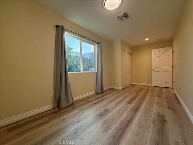 a view of an empty room and window