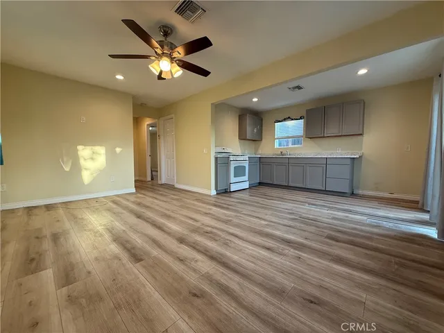a view of kitchen and windows