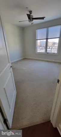 a view of empty room with windows