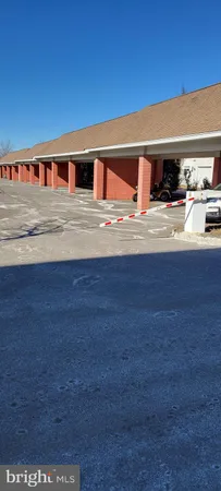 a swimming pool with outdoor seating