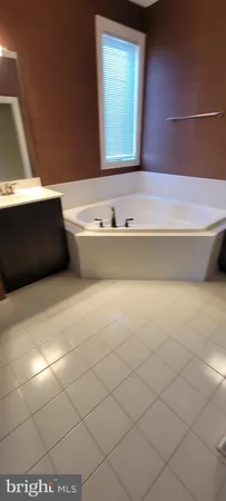 a bathroom with a bathtub