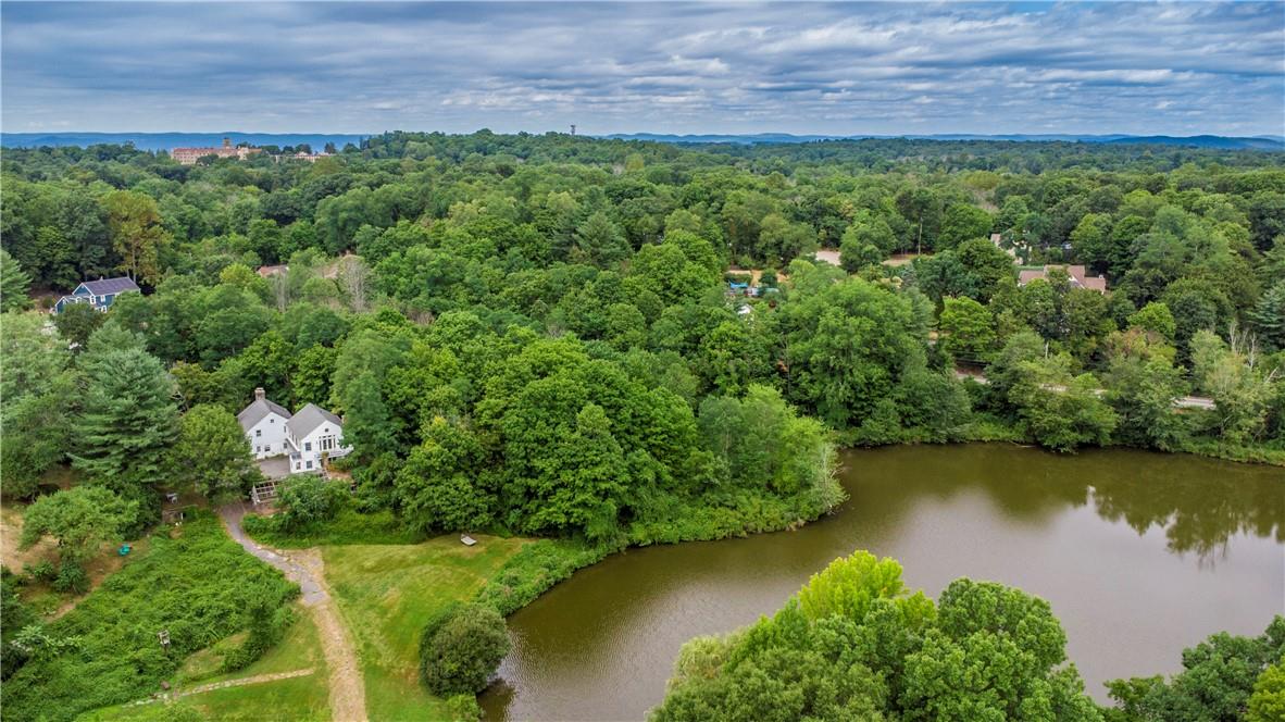 Escape to the country right here in Ossining & New Castle with 3.94 acres including a shared pond. Let's get closer to this unique property dubbed The Pond House & The Greenhouse accessory apartment.
