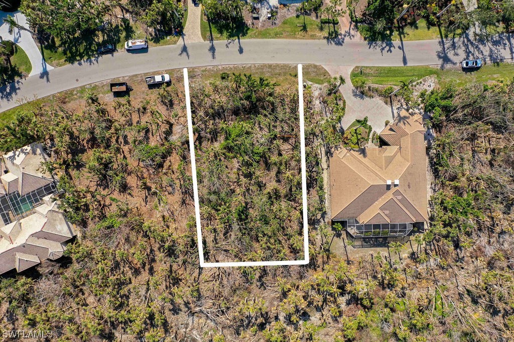 2356 Wulfert Road Sanibel, FL 33957 - Photo 11 of 23 an aerial view of a house with a yard and garden