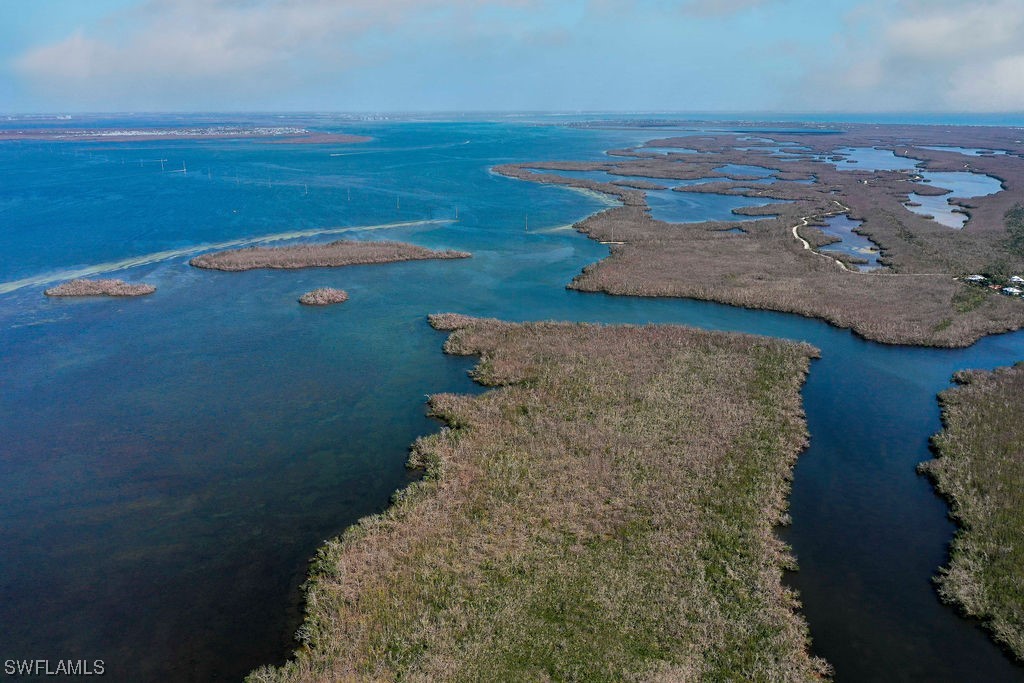 2356 Wulfert Road Sanibel, FL 33957 - Photo 18 of 23 a view of balcony with furniture