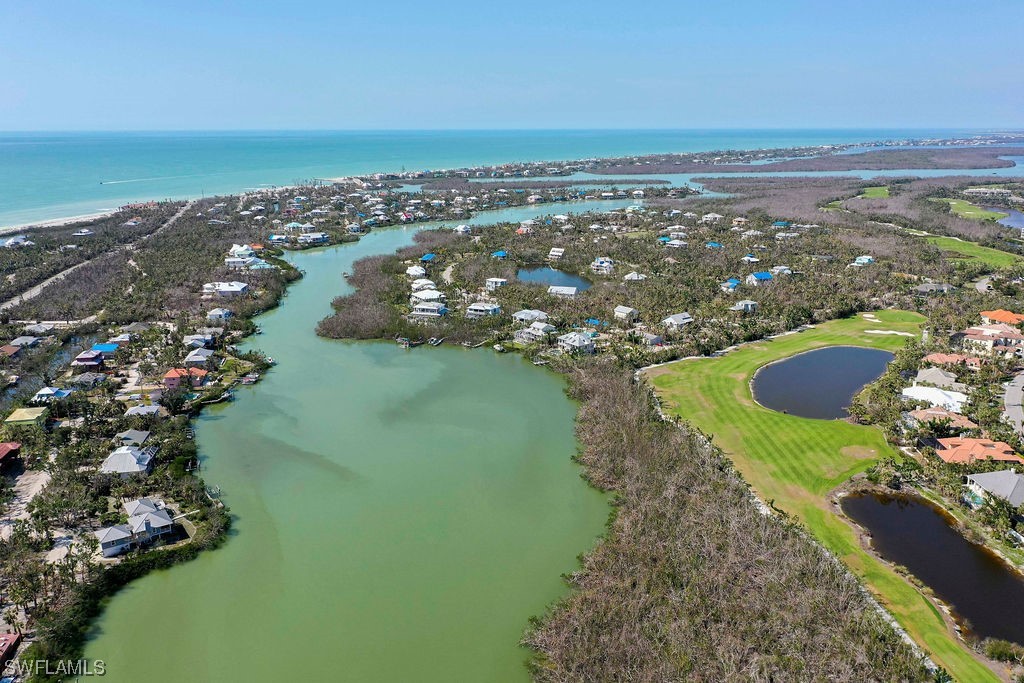 2356 Wulfert Road Sanibel, FL 33957 - Photo 4 of 23 a view of a lake with a city