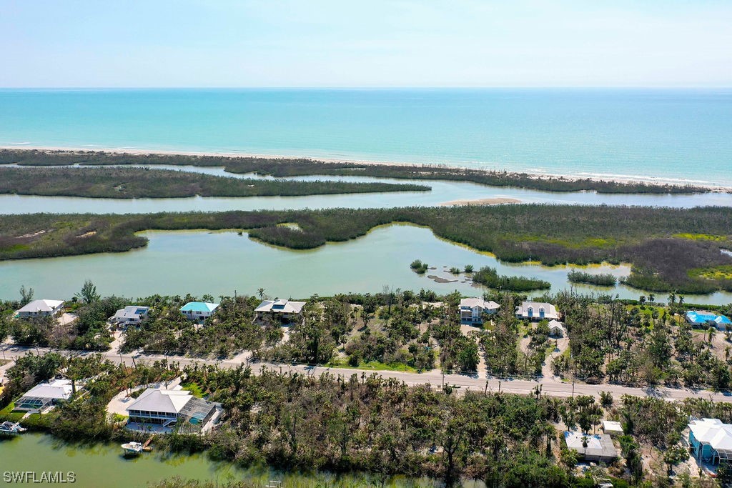 2356 Wulfert Road Sanibel, FL 33957 - Photo 6 of 23 a view of a lake with houses