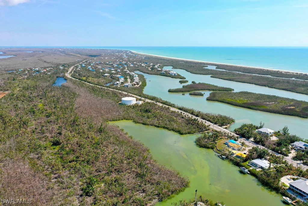2356 Wulfert Road Sanibel, FL 33957 - Photo 7 of 23 an aerial view of a city with a lake view