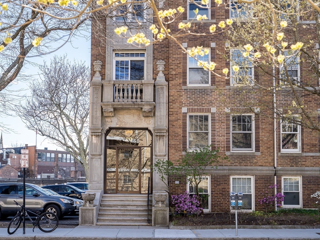 20 John Street, Unit 3 Brookline, MA 02446 - Photo 22 of 23 a car parked in front of a building