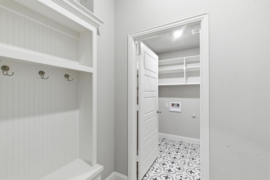 972 Sam Street Springtown, TX 76082 - Photo 13 of 34 a bathroom with a shower and a toilet