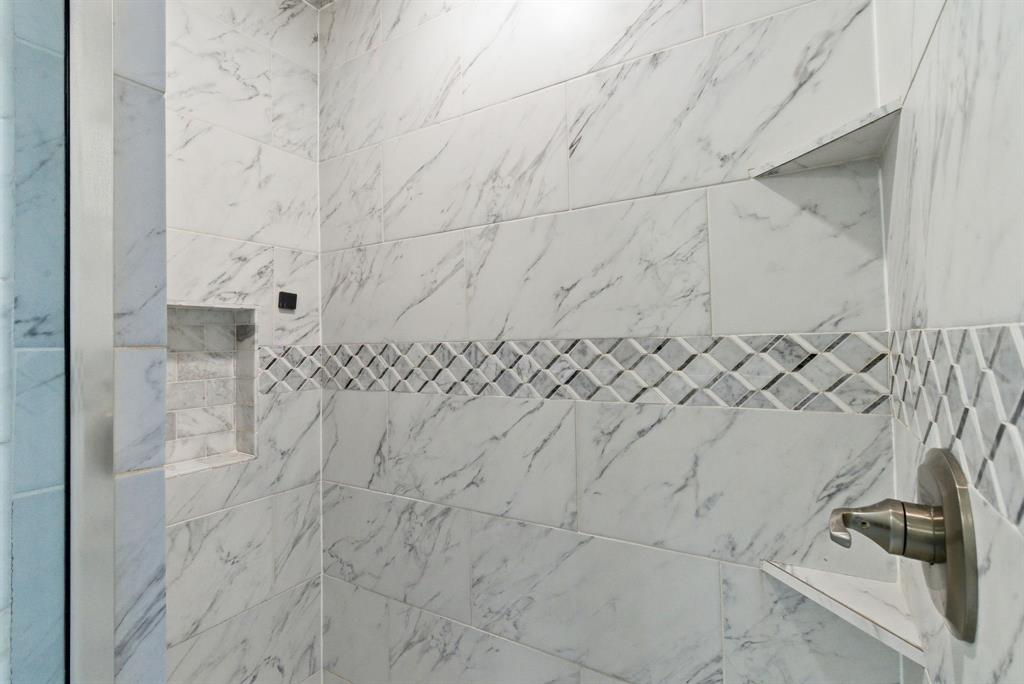 972 Sam Street Springtown, TX 76082 - Photo 19 of 34 a bathroom with a shower