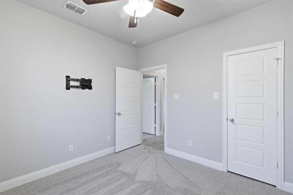 972 Sam Street Springtown, TX 76082 - Photo 28 of 34 wooden floor in an empty room