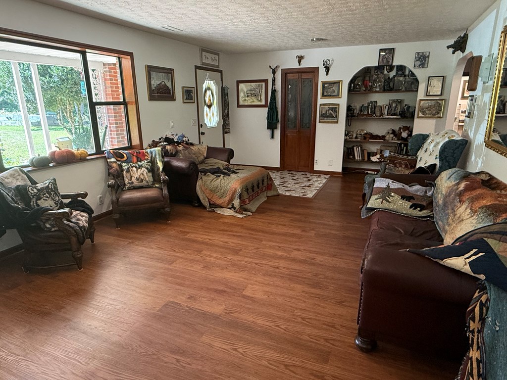 10809 Beaver Dam Road Murphy, NC 28906 - Photo 13 of 46 a bedroom with furniture and a large window