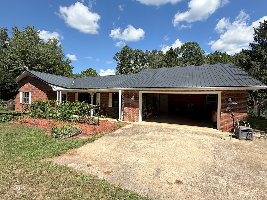10809 Beaver Dam Road Murphy, NC 28906 - Photo 2 of 46 a house with trees in the background