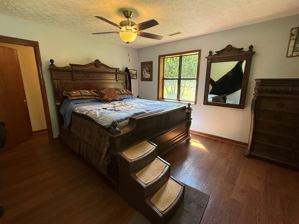 10809 Beaver Dam Road Murphy, NC 28906 - Photo 21 of 46 a bed sitting in a room next to a window