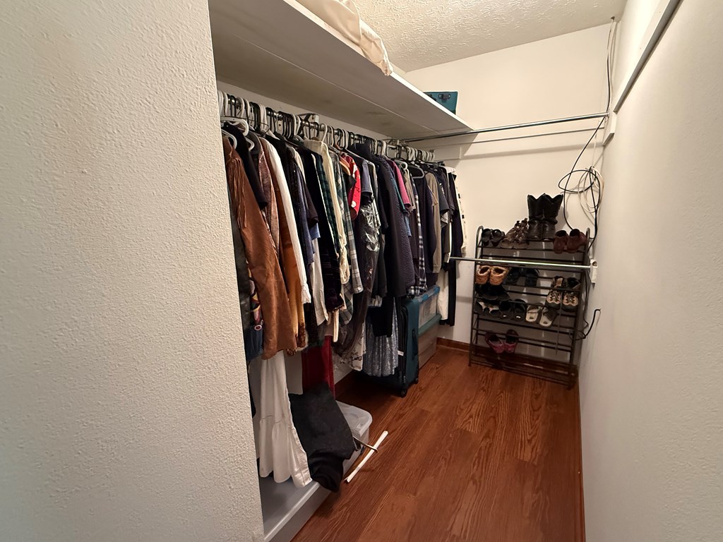 10809 Beaver Dam Road Murphy, NC 28906 - Photo 23 of 46 a view of walk in closet with clothes