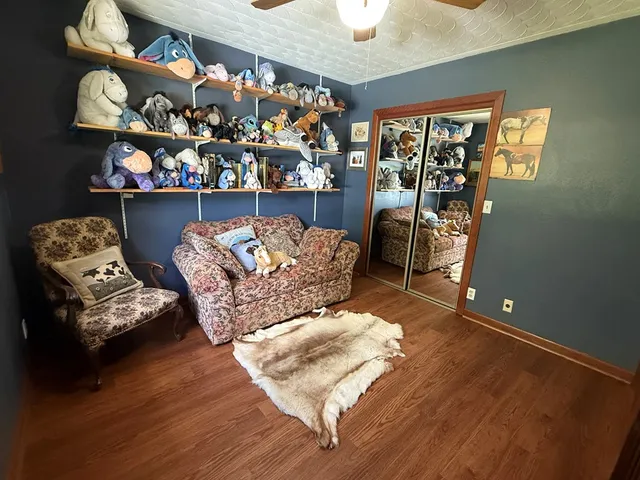 an entryway with wooden floor and walls