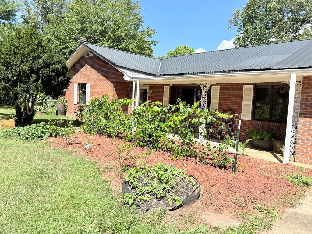 10809 Beaver Dam Road Murphy, NC 28906 - Photo 7 of 46 a view of a house with yard and sitting area