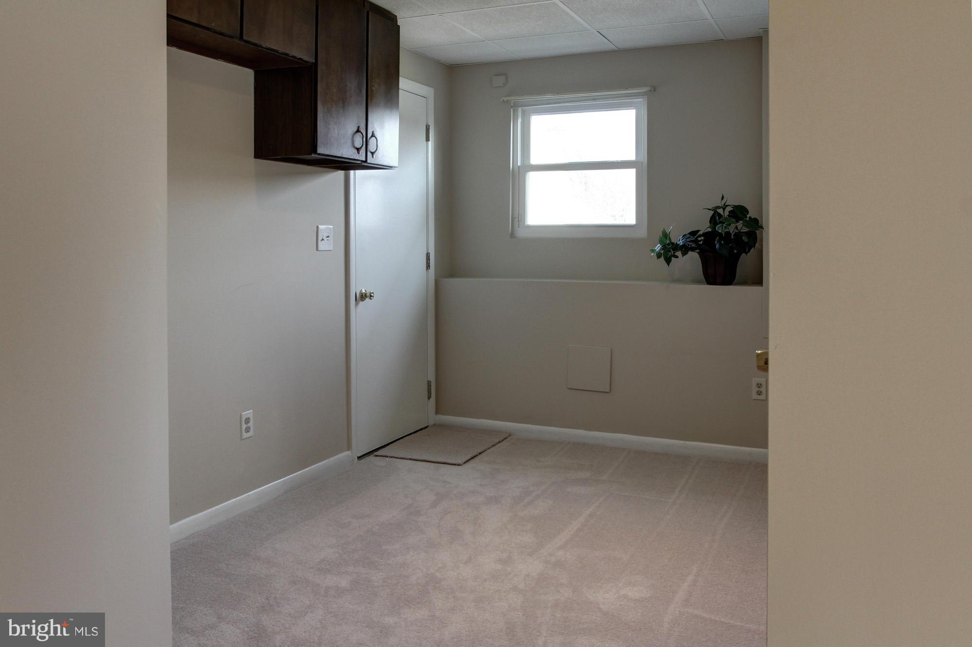 8015 Pine Ridge Road Pasadena, MD 21122 - Photo 14 of 17 Den - could be 4th bedroom