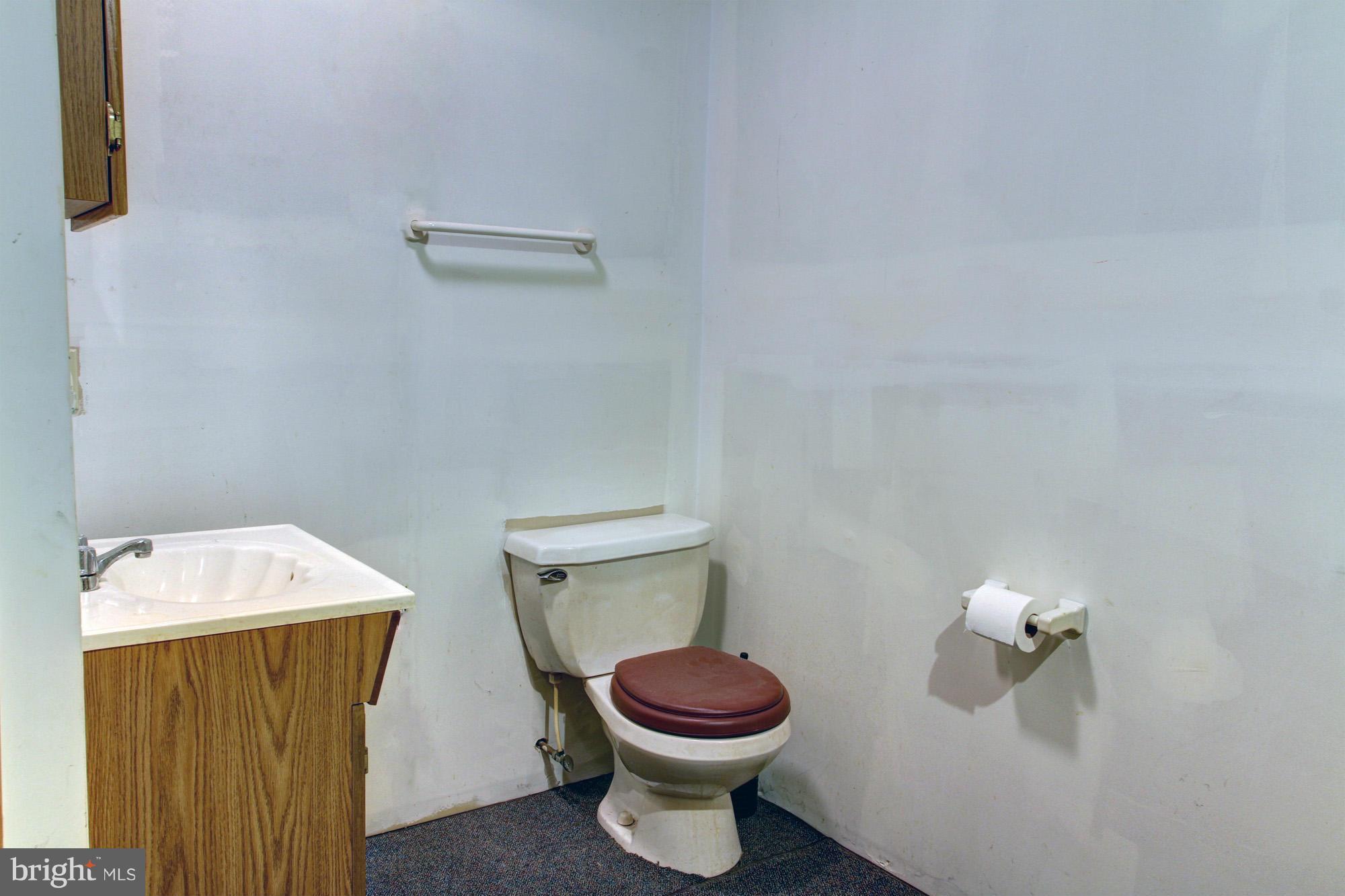 8015 Pine Ridge Road Pasadena, MD 21122 - Photo 15 of 17 Powder room in lower level