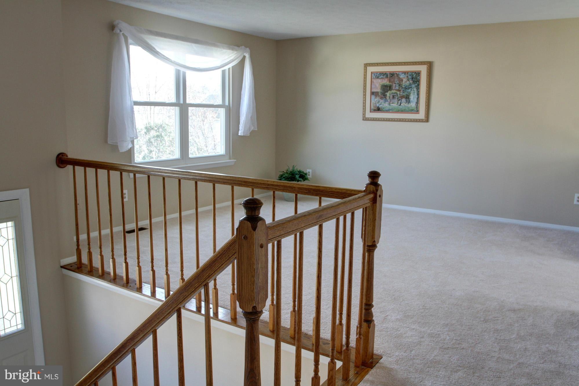 8015 Pine Ridge Road Pasadena, MD 21122 - Photo 4 of 17 Living Room is light and bright