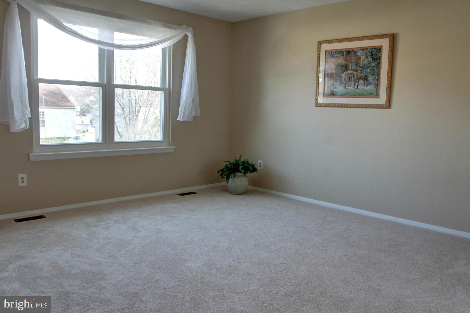 8015 Pine Ridge Road Pasadena, MD 21122 - Photo 5 of 17 Living Room - light and bright