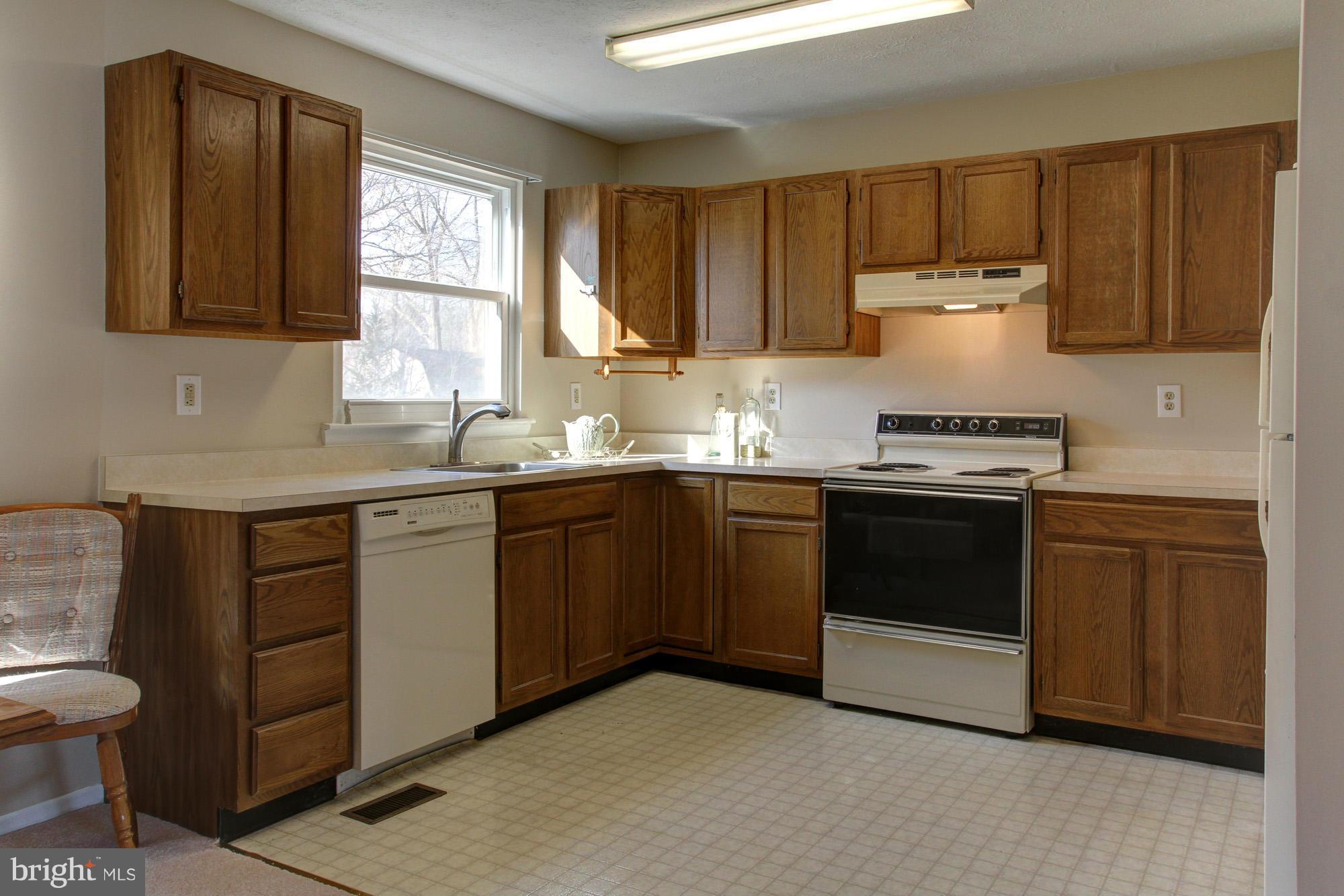 8015 Pine Ridge Road Pasadena, MD 21122 - Photo 7 of 17 Kitchen is large and spacious