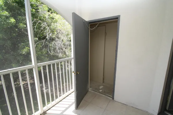 a view of a porch with a yard