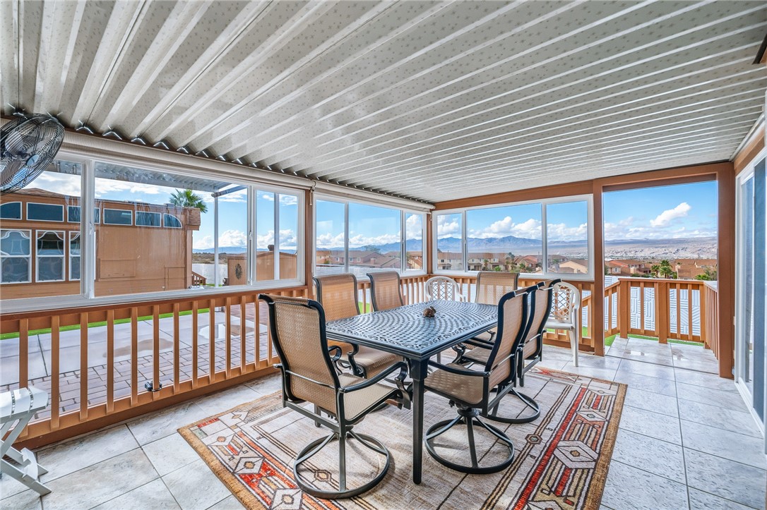2000 Ramar Road, Unit 126 Bullhead City, AZ 86442 - Photo 26 of 65 Sunroom with a mountain view and healthy amount of natural light