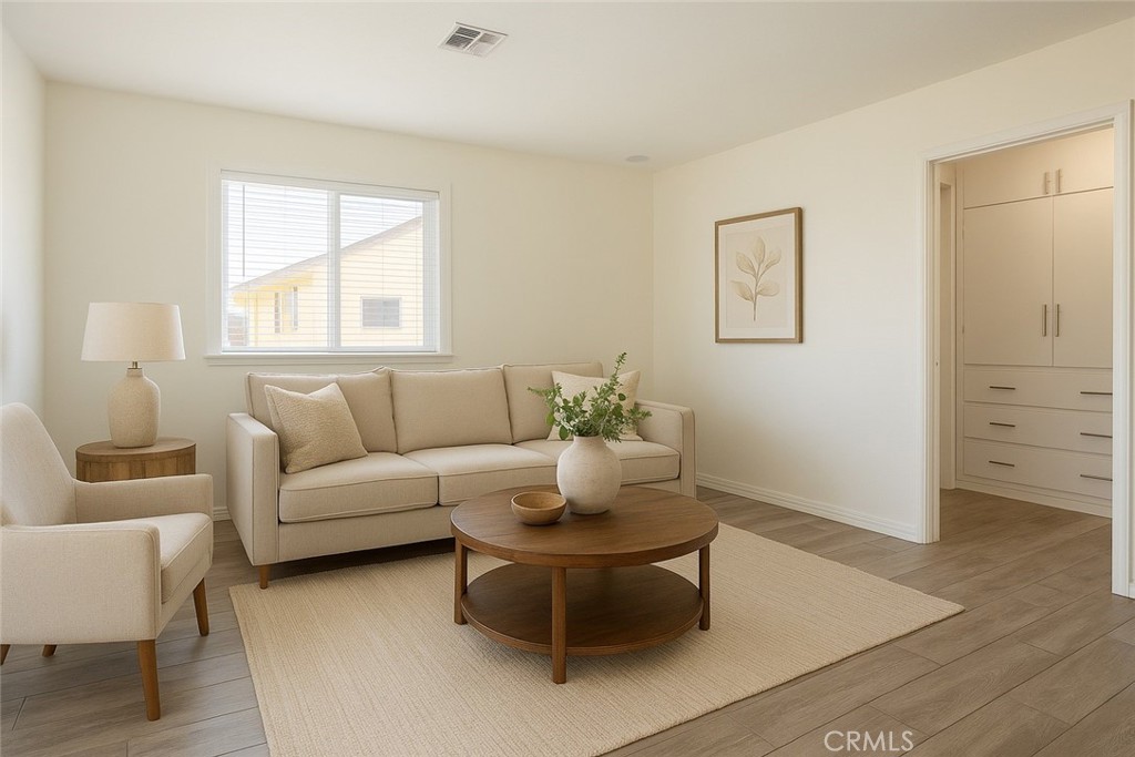 5923 Tyler Street Riverside, CA 92503 - Photo 3 of 19 a living room with furniture and a window