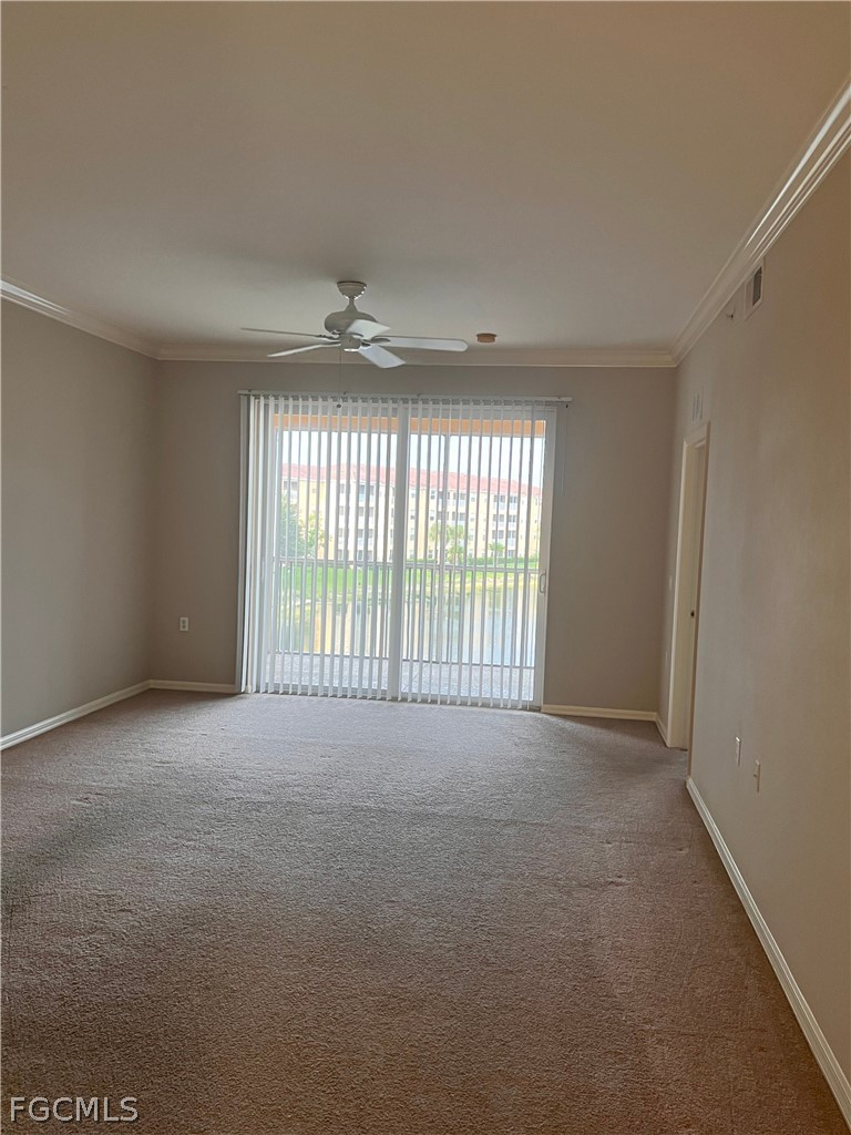 8570 Kingbird Loop, Unit 535 Estero, FL 33967 - Photo 4 of 14 a view of an empty room with a window