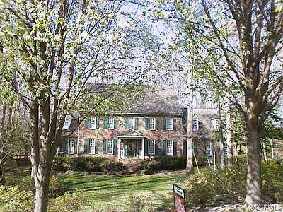 front view of house with a garden
