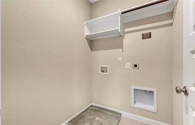 a bathroom with a double vanity sink toilet and shower