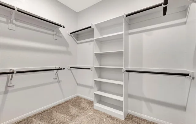 a view of a room with rack on the wall