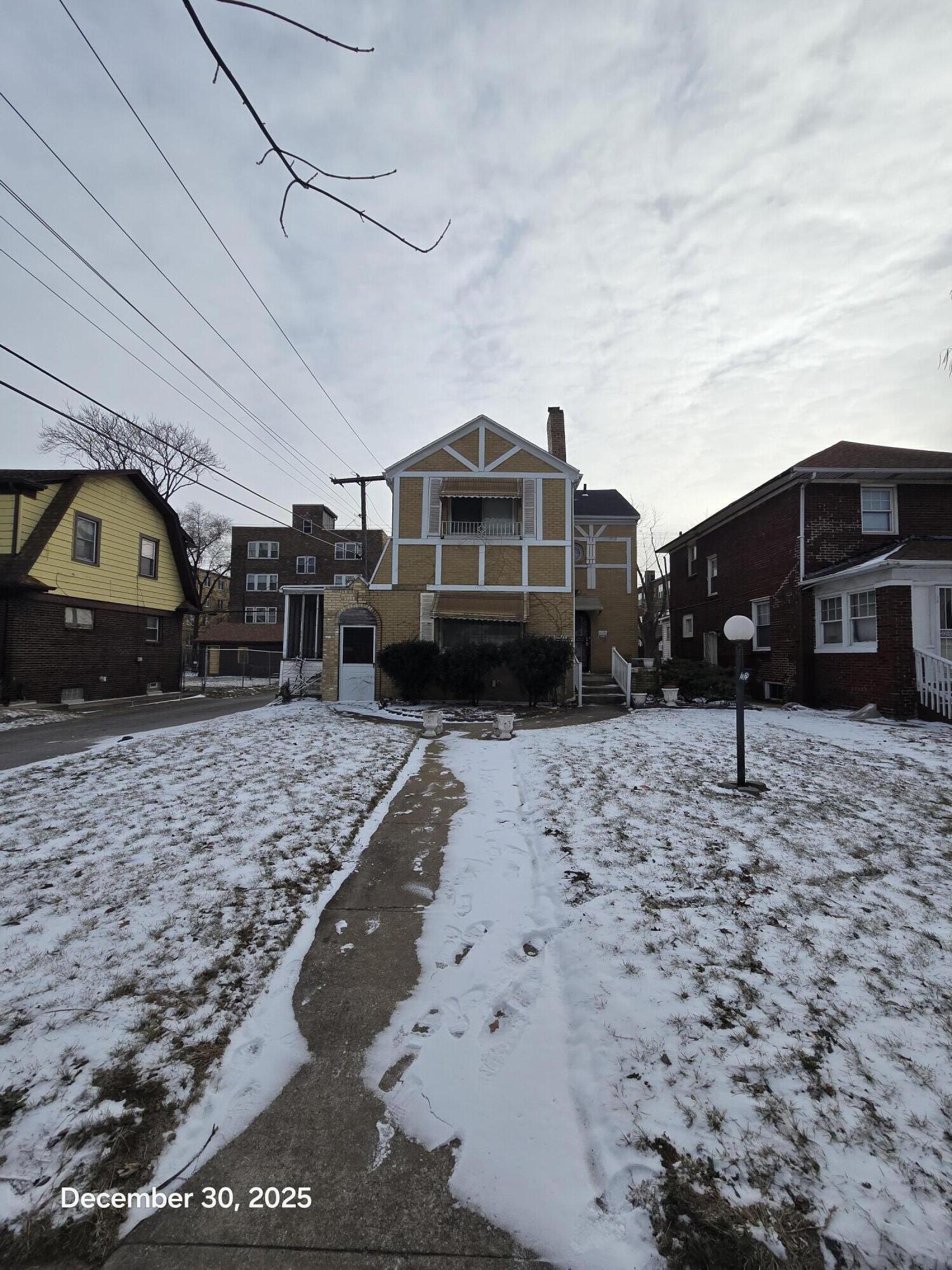 2025 West 4th Place Gary, IN 46404 - Photo 1 of 1 a front view of a house with a yard