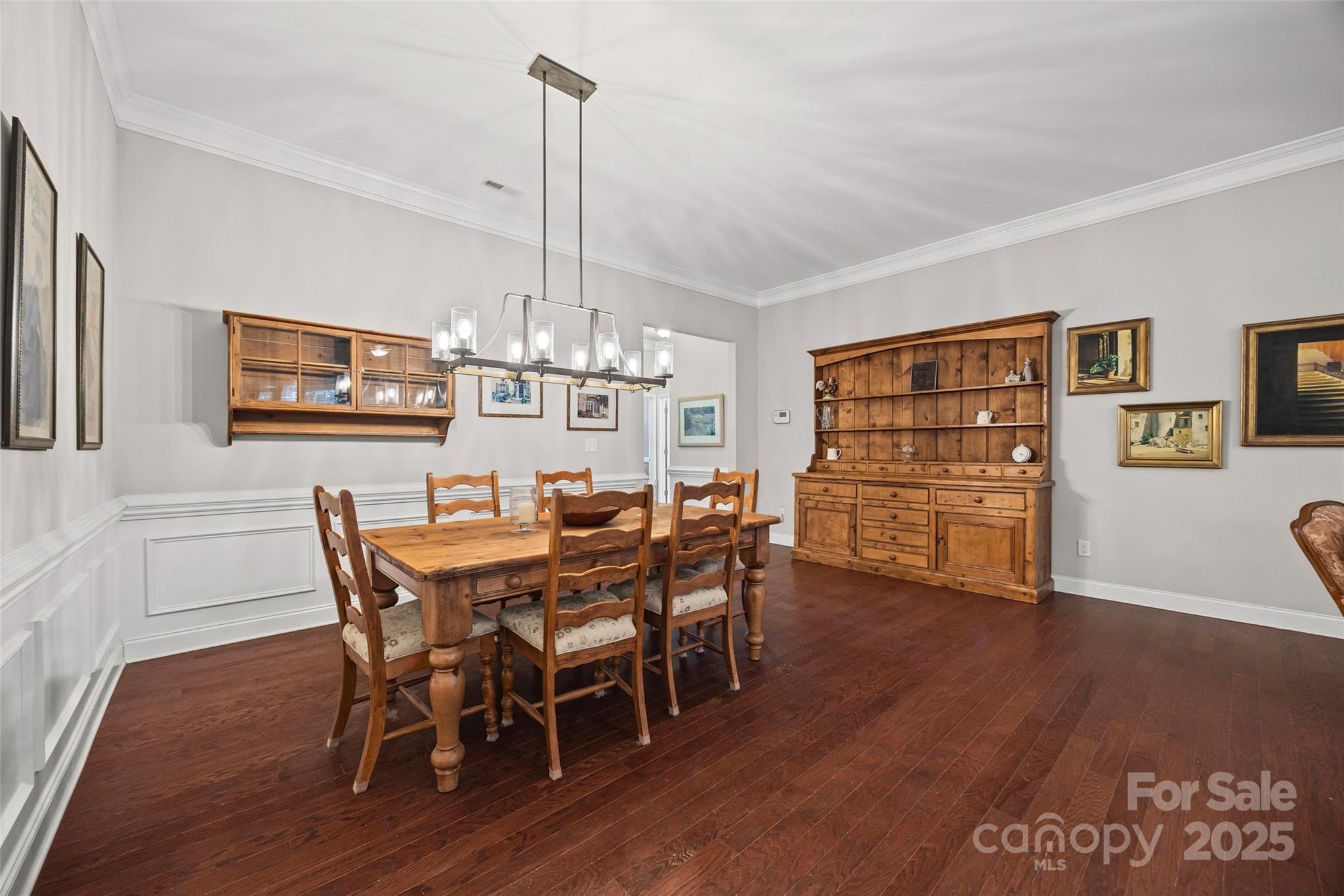 1541 Hedge Apple Road Clover, SC 29710 - Photo 11 of 48 a view of a dining room with furniture wooden floor and chandelier