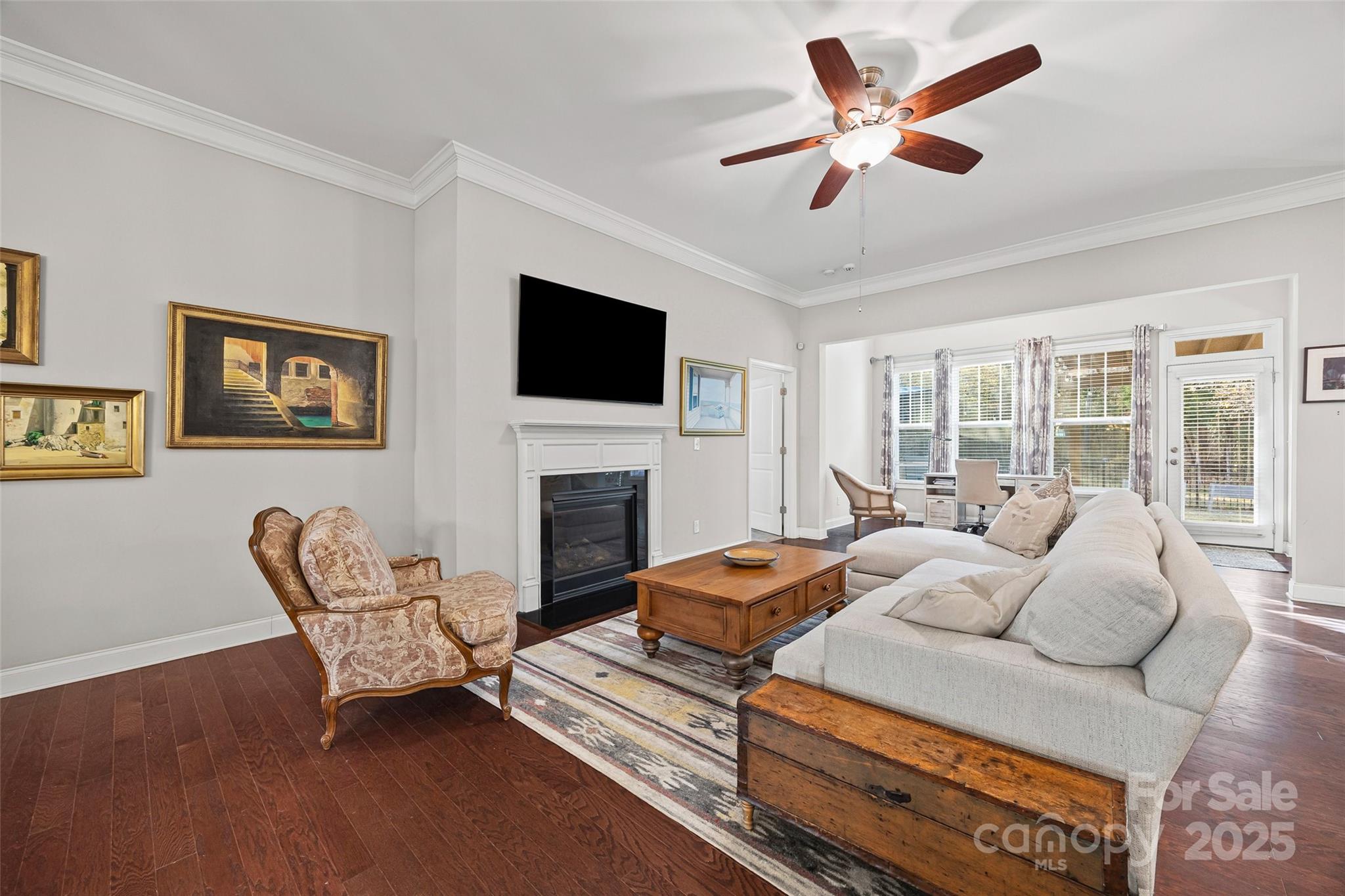 1541 Hedge Apple Road Clover, SC 29710 - Photo 18 of 48 a living room with furniture a fireplace and a flat screen tv